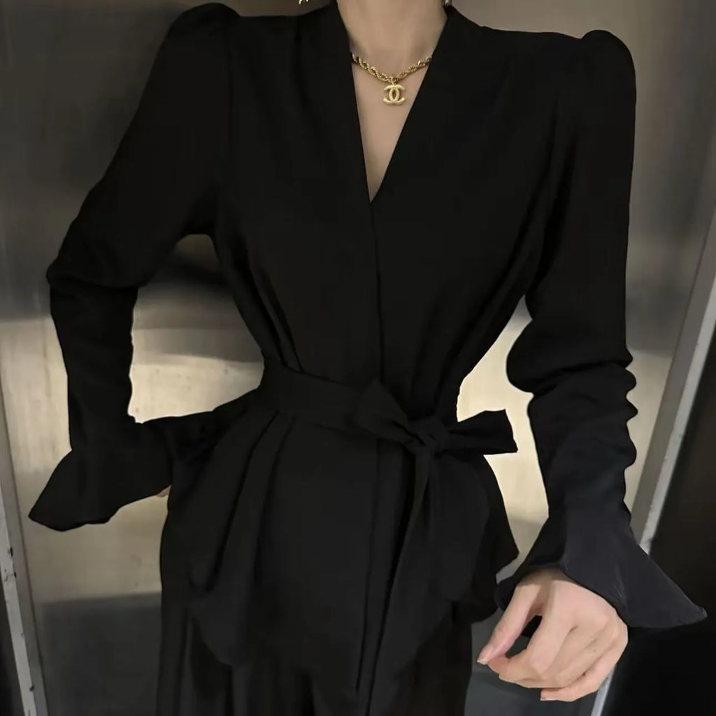 Women's black French-style shirt with an irregular collar and flared bell sleeves