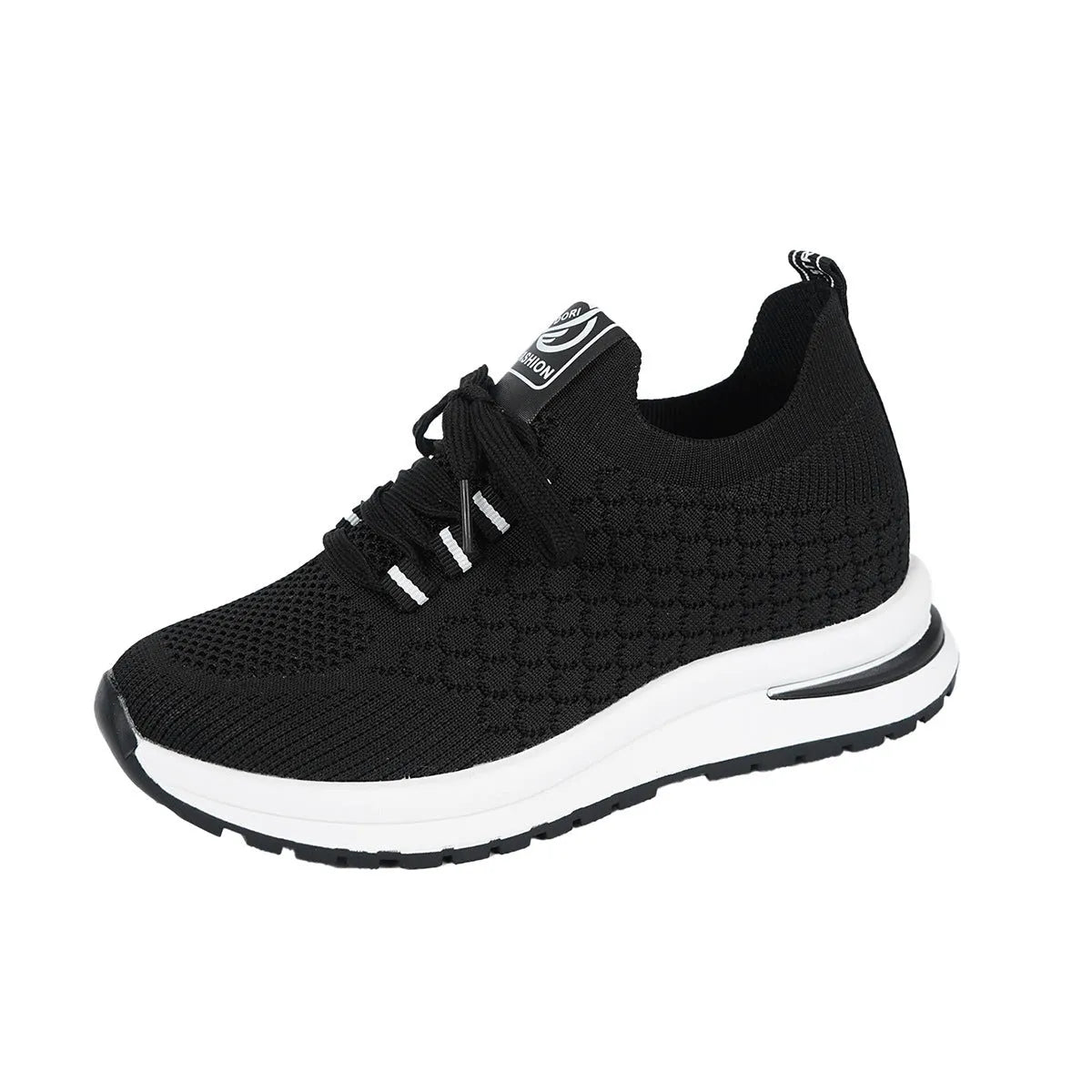 Women's black and white lace-up mesh platform sneakers with a flat rubber sole on a neutral background.