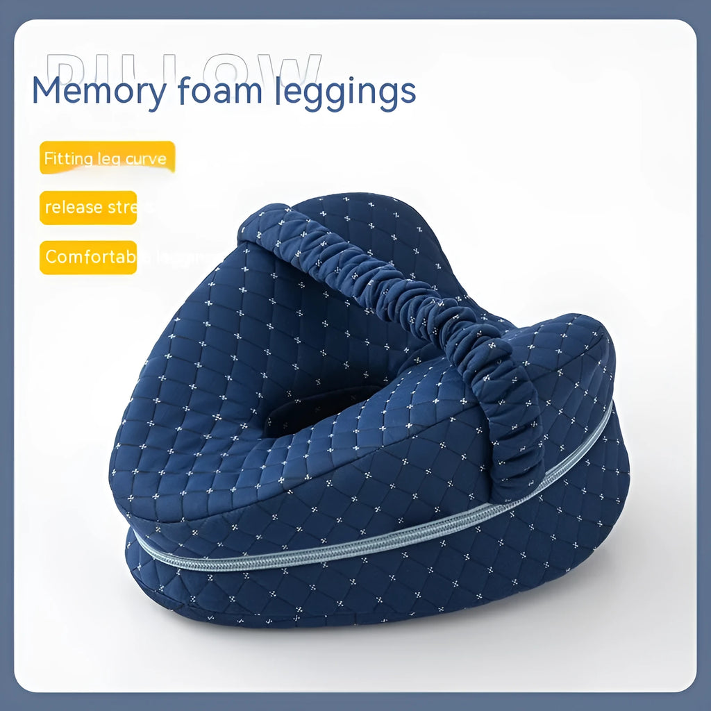 Love heart shaped memory foam leg pillow in dark blue jacquard fabric, shown next to a tape measure indicating 25x23x13 cm dimensions.