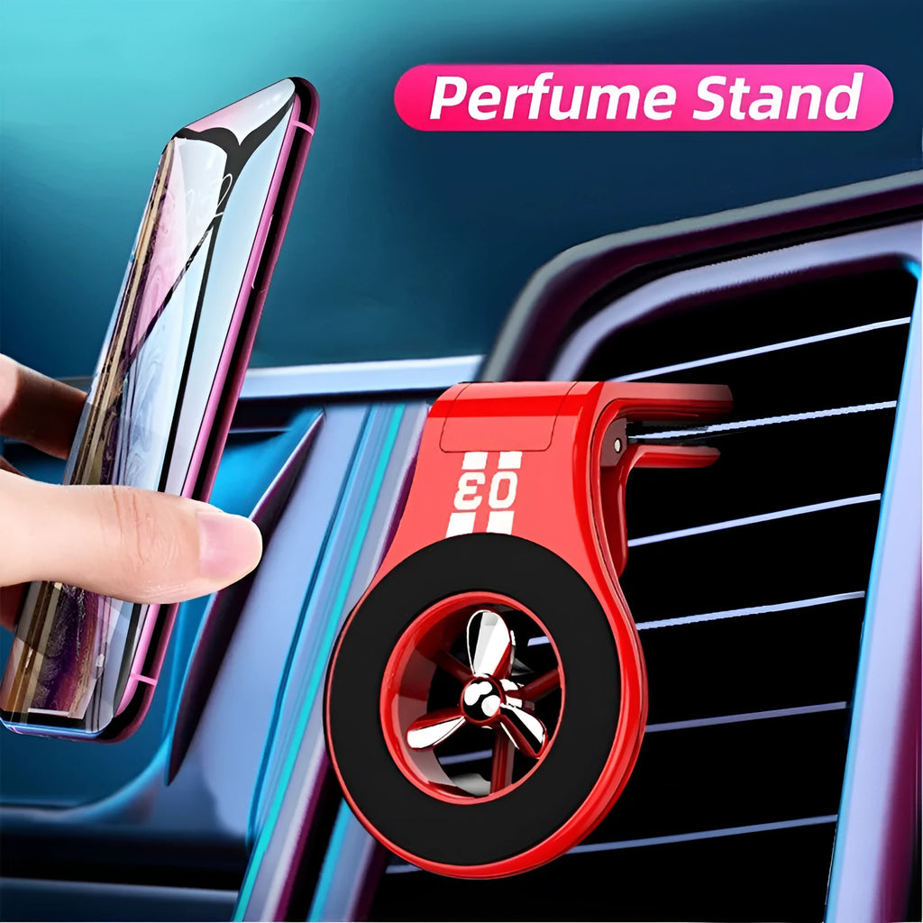 Black magnetic phone holder clipped onto a car air vent, showing phone attached and 360-degree rotation.
