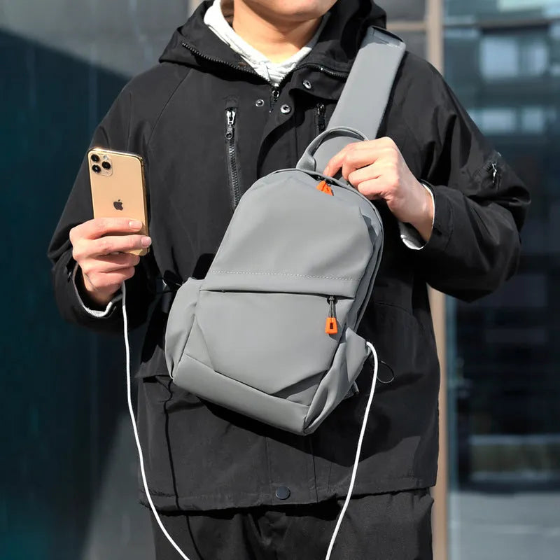 Men's black polyester crossbody bag with waterproof material and minimalist design