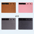 Pink PU leather wireless charging mouse pad with phone holder, 320x260 mm, on a desk.