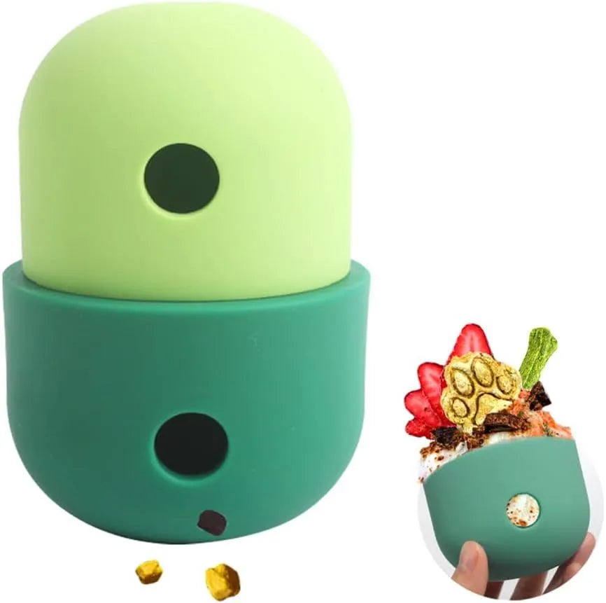 Food grade silicone dog puzzle treat ball in blue and white, shown next to dog treats.