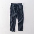 Men's straight-leg linen trousers in mid-waist design showing colour options