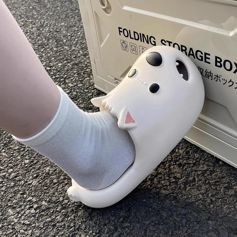 White and black women's EVA puppy slippers with toe cap sandal design showing injection moulded soles