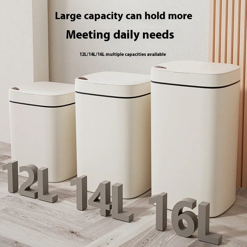 Automatic sensor bin with square white body and open induction lid on a kitchen floor.