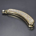 Rhinestone chicken leg banana hairpin in black, plastic with rhinestone diamond inlay, approx 10cm long.
