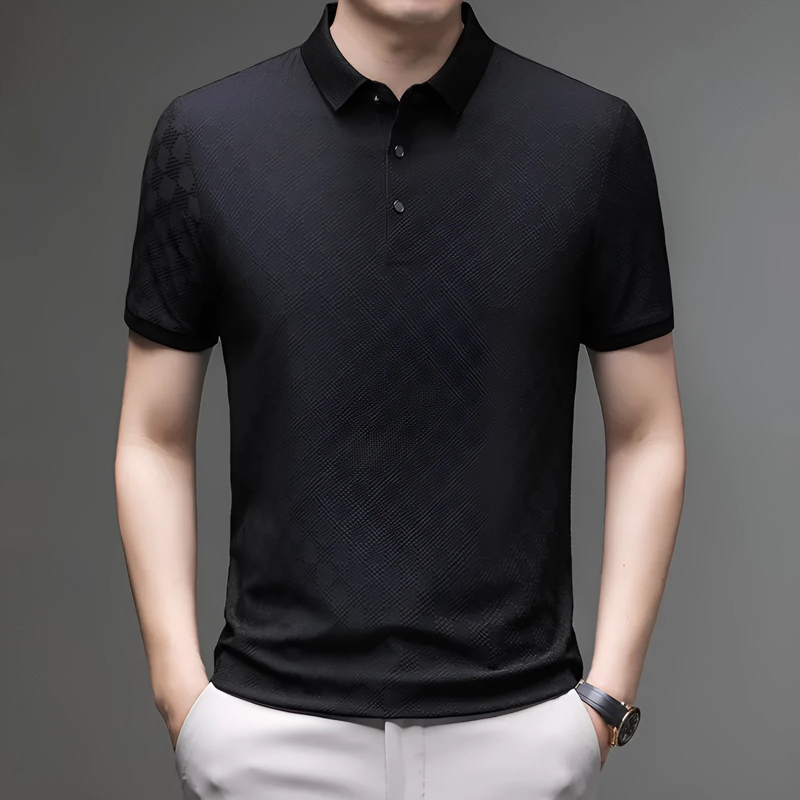 Man wearing a thin black T-shirt with a rhombus-shaped slit detail on the chest.