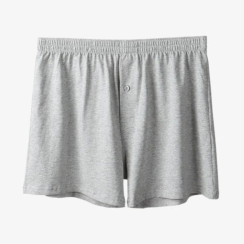 Men's loose fit high waist boxer shorts in pure cotton, shown in light grey, dark blue, and black colours.