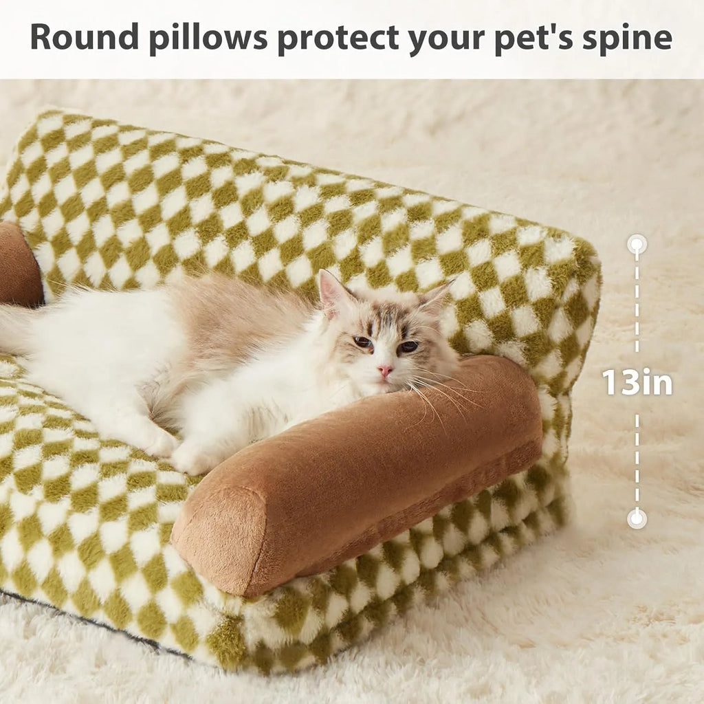 Checkered grey and white pet sofa bed for small dog or cat on wooden floor.