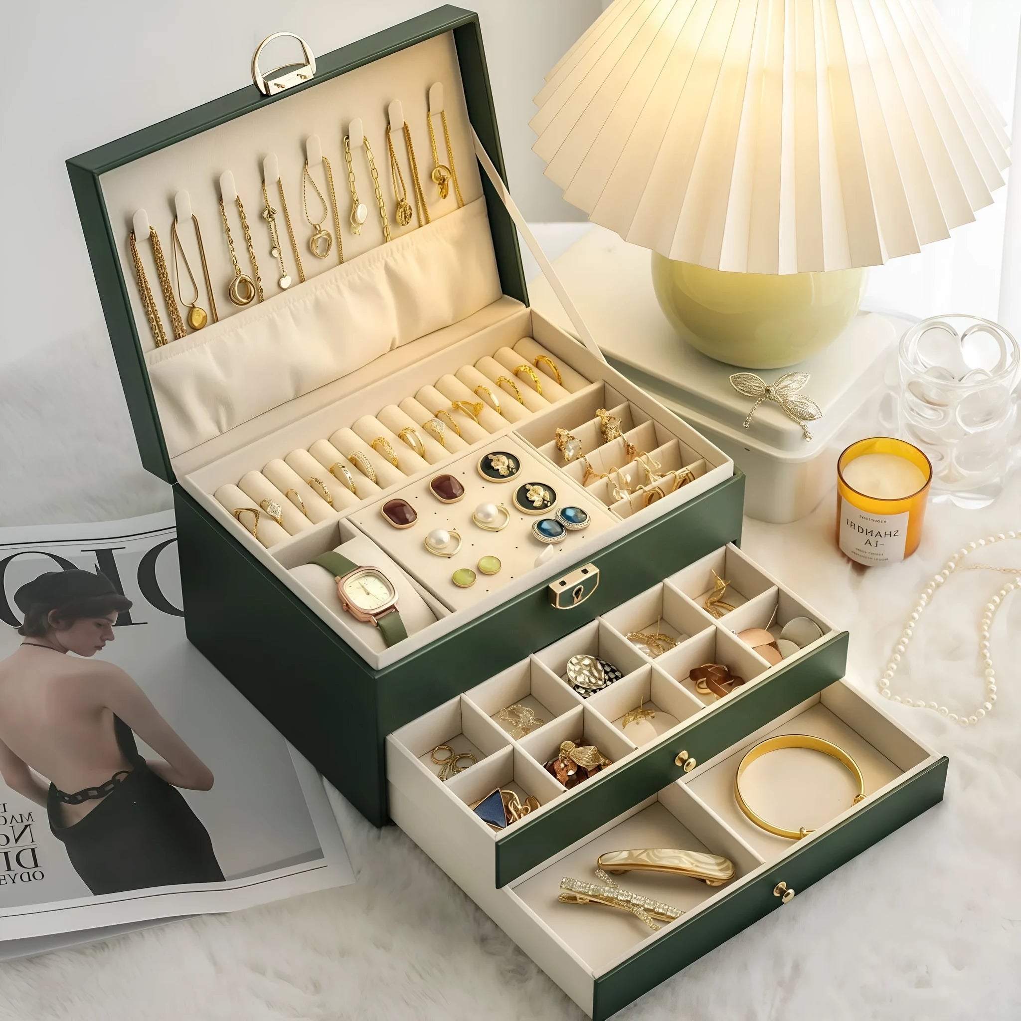 Leather jewellery storage box with three drawers open showing removable dividers and satin lining in four colour options