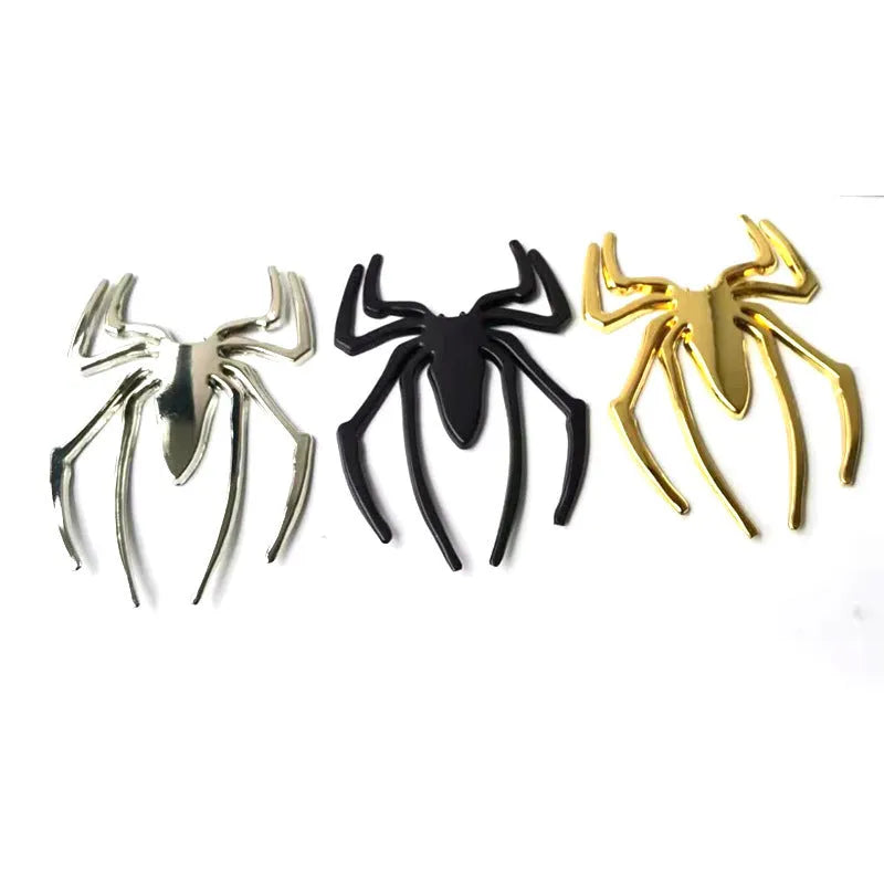 3D metal spider bumper sticker in gold on a car bumper