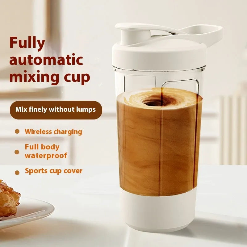 Black and silver electric protein shaker bottle with digital display and mixing blade inside