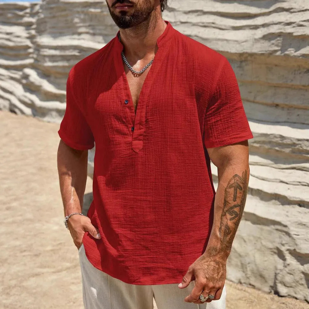 Men's solid colour short-sleeved shirt with a stand collar, shown in a casual style.