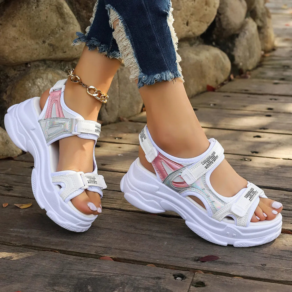 Women's white PU Roman platform sandals with a rubber sole on a plain background.