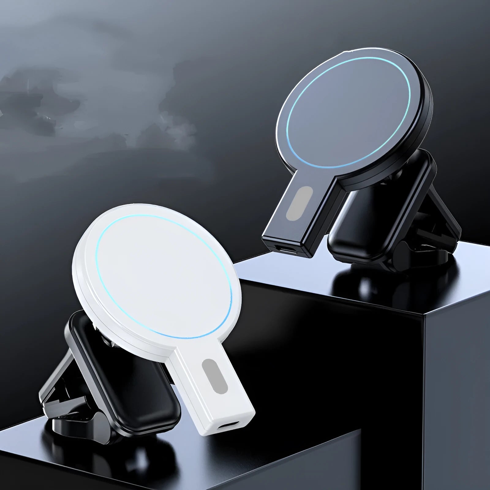 Magnetic absorption wireless charger in black and white showing compact design with charging cable