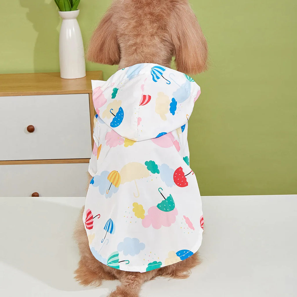 Colourful cartoon umbrella pattern dog raincoat in size M on a mannequin.