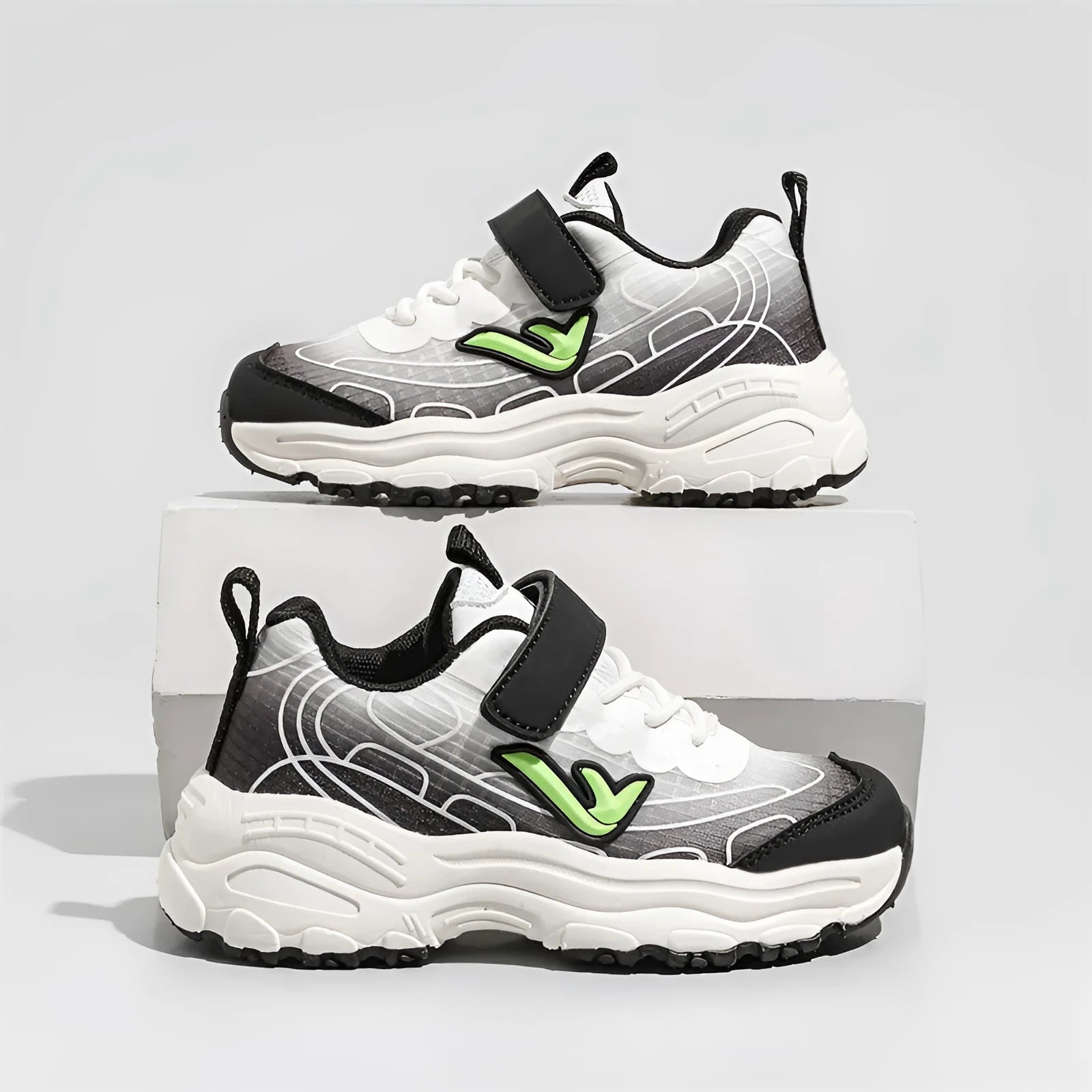 Children's black and purple striped lace-up sports shoes with mesh fabric upper and rubber sole