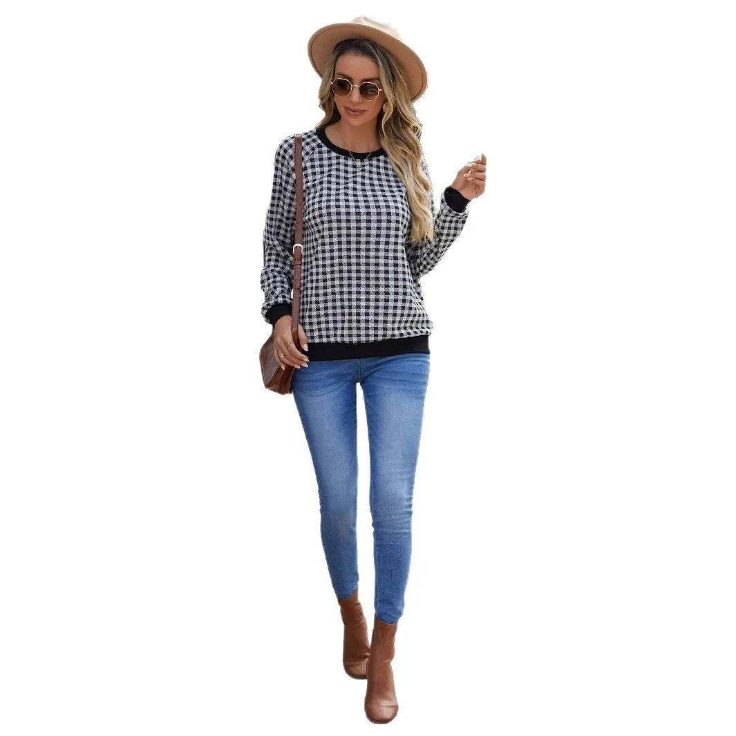 Black long sleeve polyester pullover sweater with a printed Japanese sweet plaid stripe pattern.