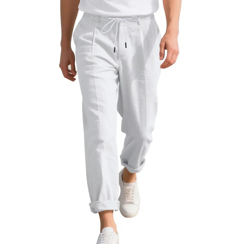 Men's light khaki linen casual trousers with drawstring waist on a hanger.