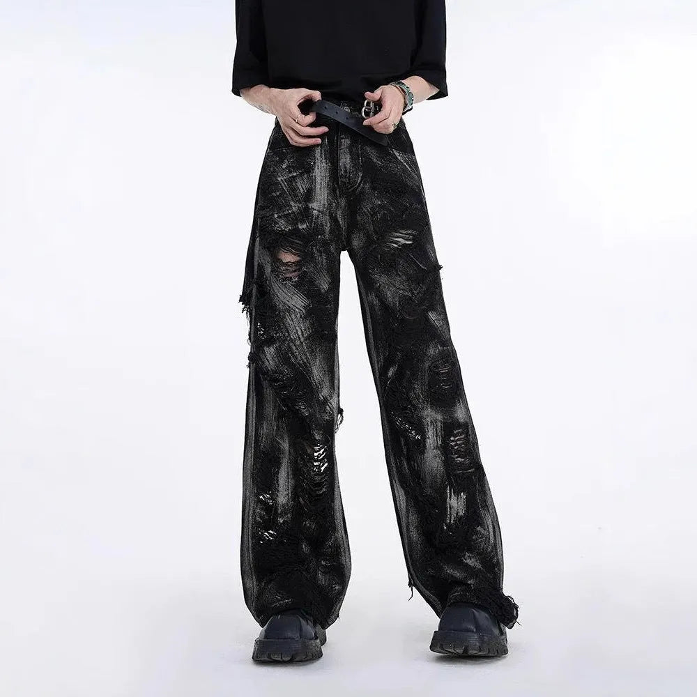 Men's long denim pants jacket with graffiti print in heavyweight washed fabric.