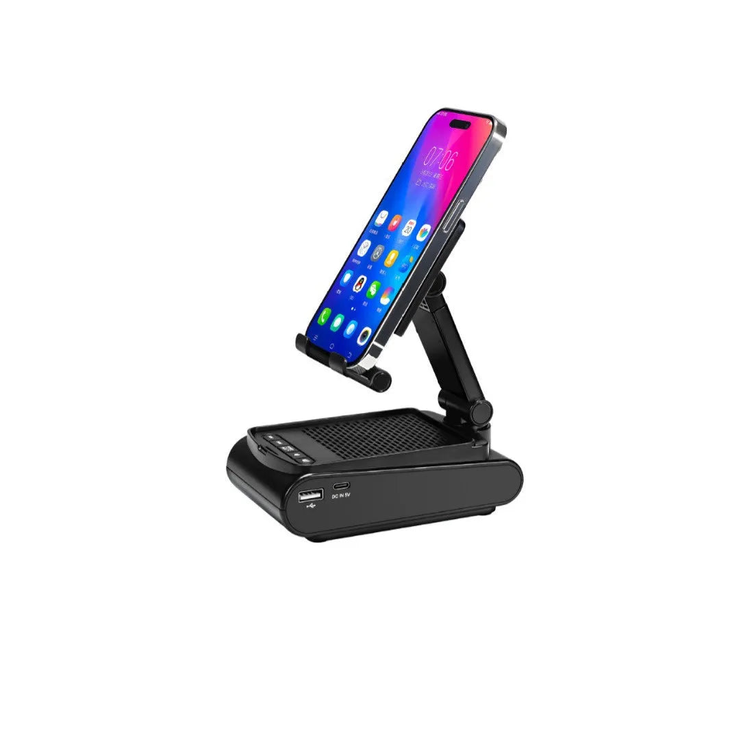 Multi-function plastic lazy phone holder with built-in Bluetooth speaker, USB powered, black colour, showing phone in stand