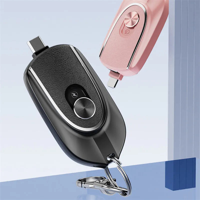 Black mini keychain power bank with Type-C and iPhone outputs, 1200mAh, hanging buckle, 71 x 19.5 x 38mm