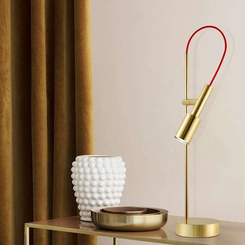 Simple modern rotating table lamp in sand black finish with wrought iron base and adjustable head