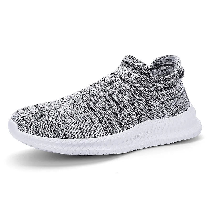 Men's low-top Flyknit sports shoe in a solid colour on a white background