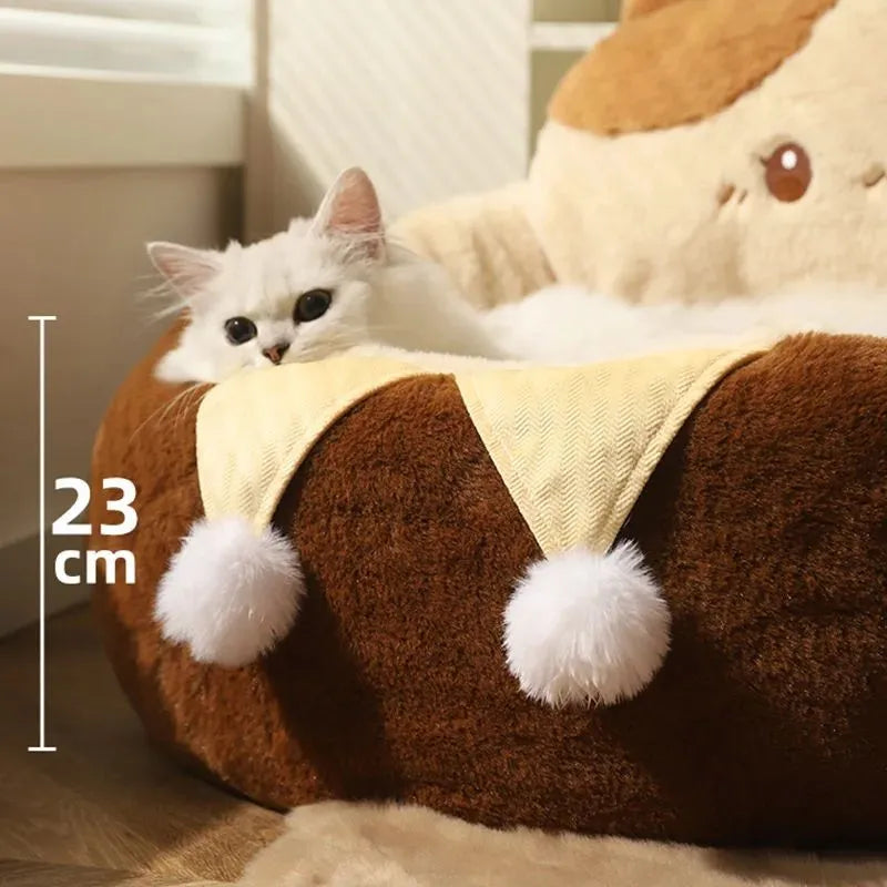 A round grey pet bed for cats and dogs on a wooden floor.