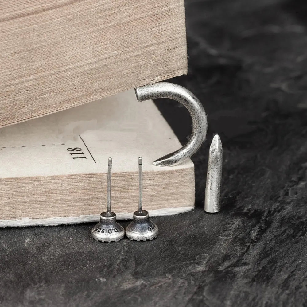 Sterling silver S925 nail-shaped stud earrings in straight and curved designs for punk fashion