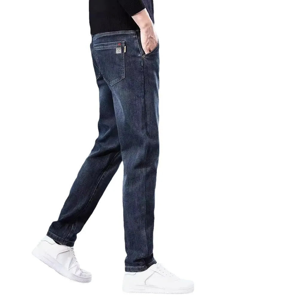 Blue grey slim straight casual trousers on a hanger, showing mid waist and straight leg design.