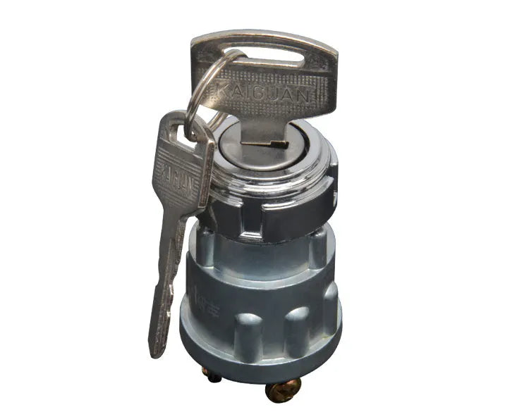 Copper automotive ignition switch and lock with key for truck and forklift repair.