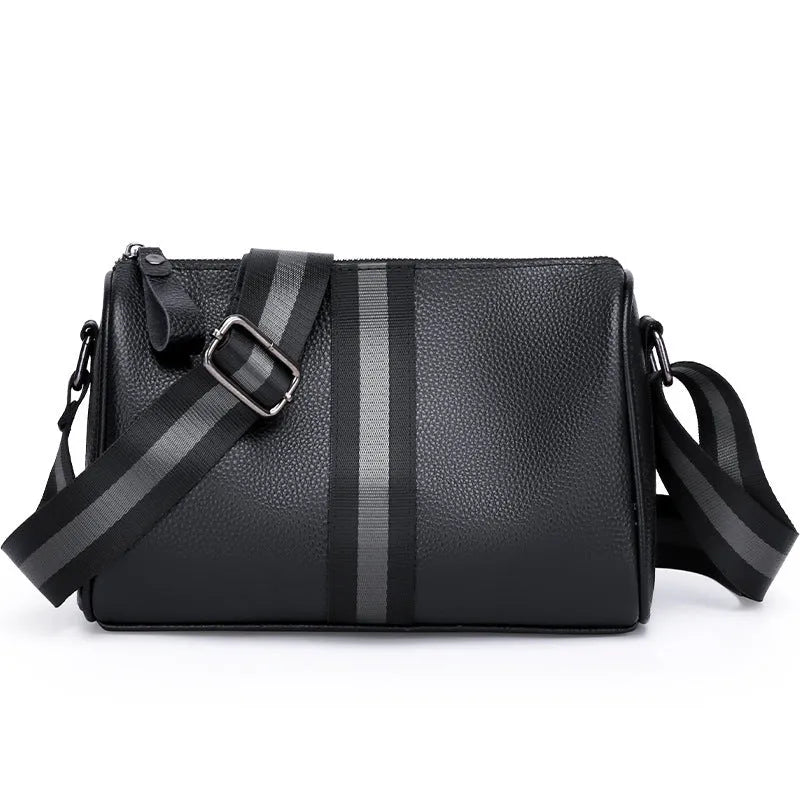 Black genuine leather one-shoulder crossbody bag showing front and interior with polyester lining