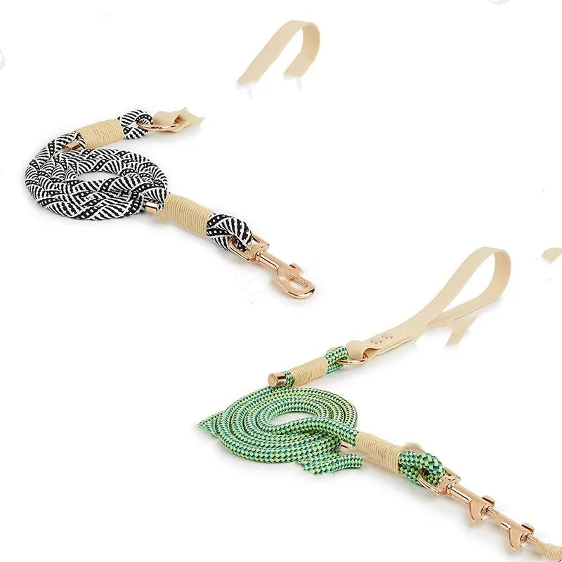 Dog hand holding rope leash with buckle in Shadow White or Wizard of Oz Green colours