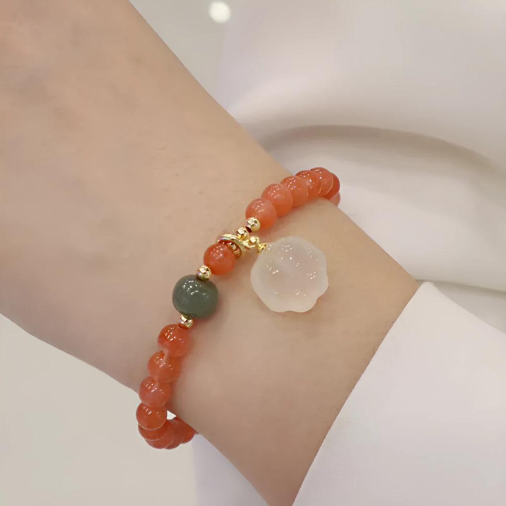 Natural red agate bracelet with zodiac animal and cat paw charms, gem inlays, 8mm bead size