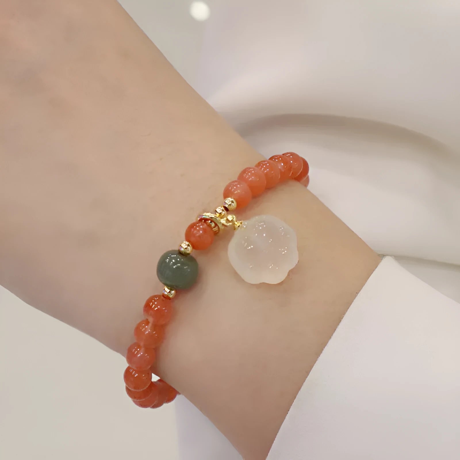 Natural red agate bracelet with zodiac animal and cat paw charms, gem inlays, 8mm bead size