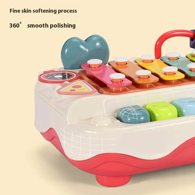 Educational eight-tone toy piano baby xylophone in coral red plastic with keys and mallets for infants