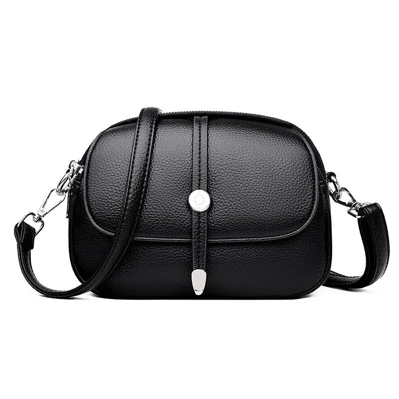 City Simple oval-shaped women's crossbody shoulder bag in khaki PU with sewing thread detail.