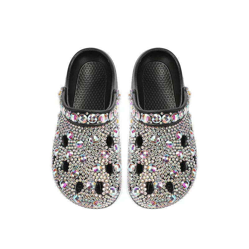 Black platform sandals with rhinestone decoration and hole design across EVA upper