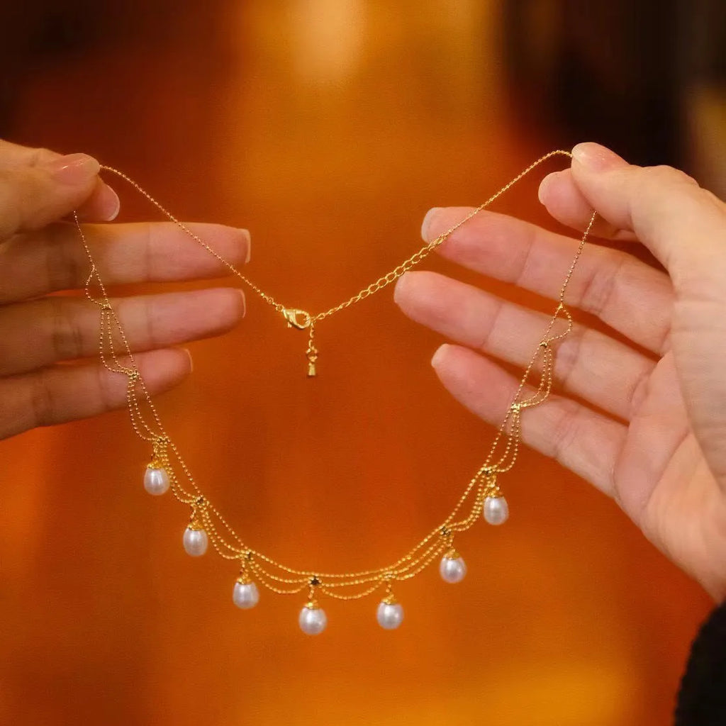 Vintage natural freshwater pearl necklace on display, 45cm clavicle chain with 14K gold plated clasp, handmade pearl lace style