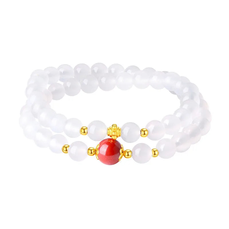 White agate women's bracelet with geometric design and Jequirity Bean Cinnabar detailing