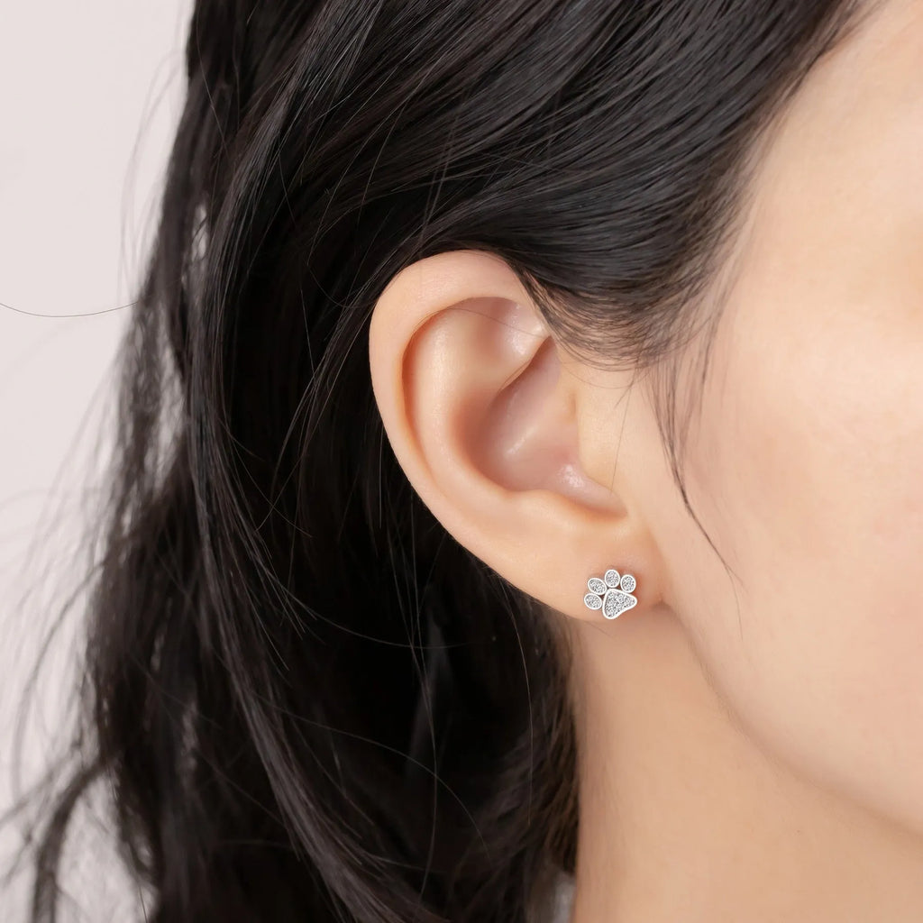 Pair of 925 sterling silver cat's paw stud earrings with full diamond zircon stone setting in silver
