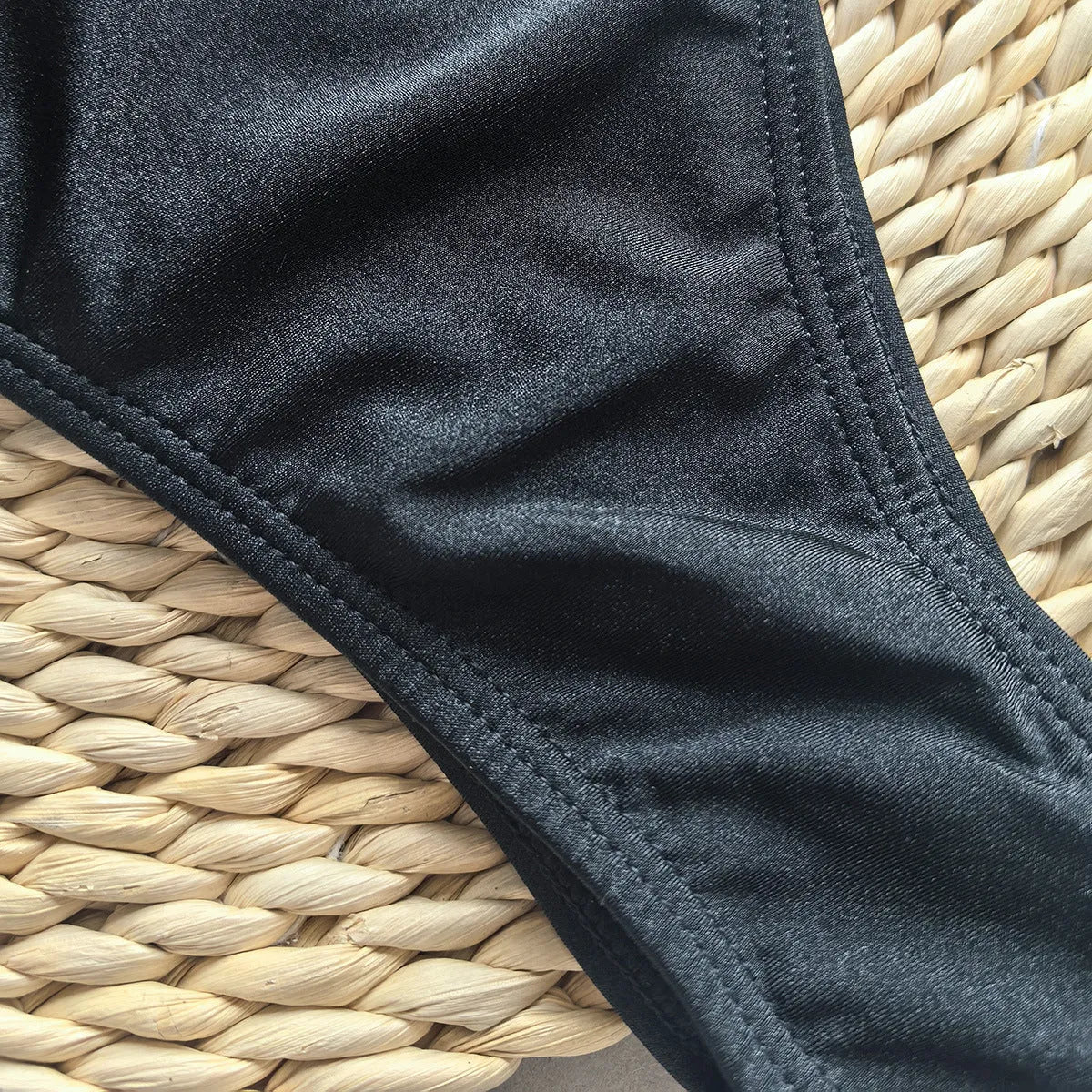 Women's solid colour one-piece swimsuit with high elasticity, shown in a European and American bikini style.