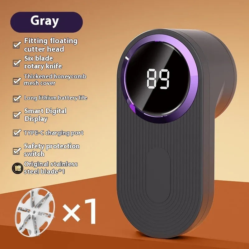 Portable electric clothes fur ball shaver in light gray with blade cover closed, battery-operated lint remover for sweaters