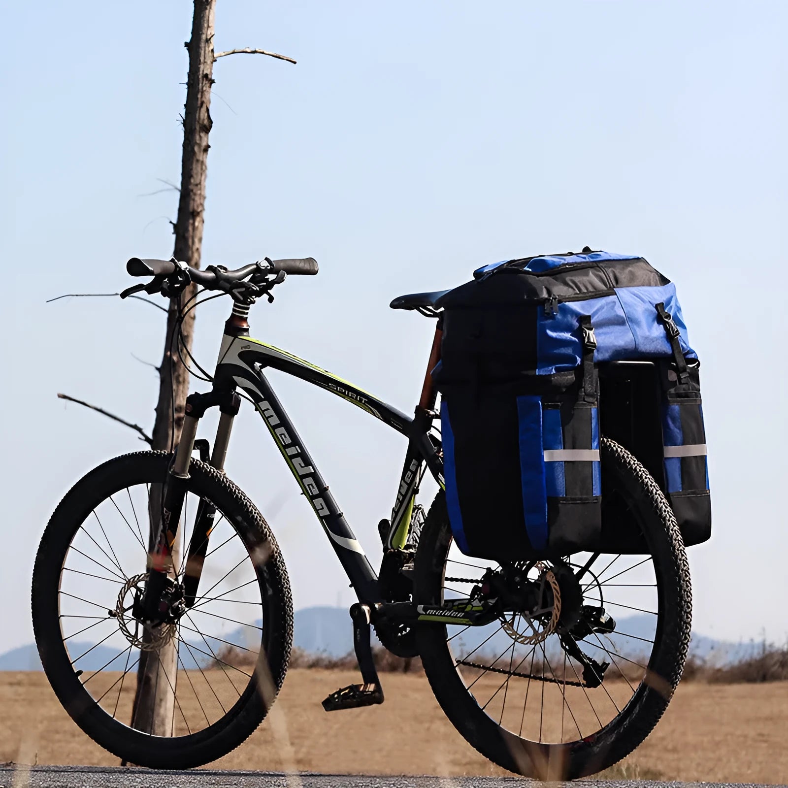 Rhinoceros 70L bicycle rear storage bag in green colour with three-in-one mounting system for touring