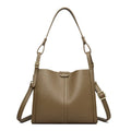 Ladies retro shoulder bag in vertical square shape showing PU material construction and internal compartments