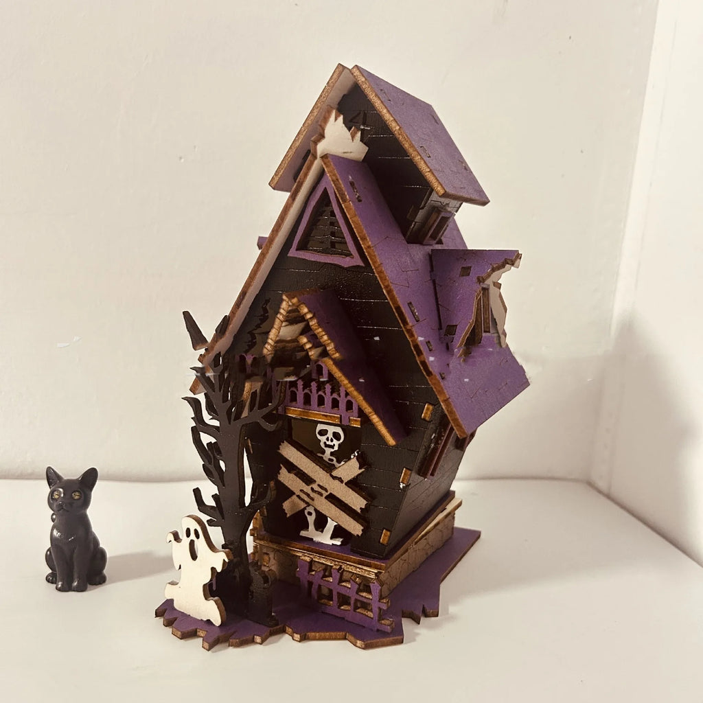 Wooden DIY haunted house Halloween table decoration measuring 14cm wide by 19cm tall