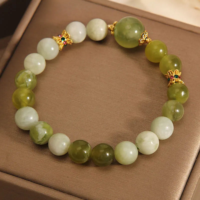 Women's Xiuyan jade bracelet in post-rain green colour with original design
