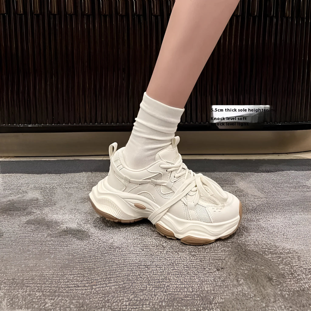 Milky white women's platform running sneaker with microfiber upper and front laces.